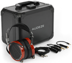 Audeze LCD-2 leather wired headphones with large ear cups and headband, showing their sleek black design and premium materials.