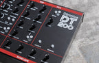 Dtronics DT-200 V3 synthesizer with knobs and interface, showcasing its compact electronic music instrument design.