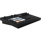 Elektron Analog Rytm MK2 synthesizer in black with knobs and pads, showcasing its professional electronic music production interface.