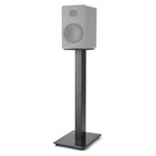 Essentials Kontur 60 stand holding a compact bookshelf speaker