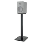 Essentials Monno 60 stand holding a compact bookshelf speaker