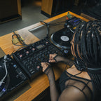 AlphaTheta Euphonia DJ mixer shown in a lifestyle setting with controls, knobs, and sleek design features.