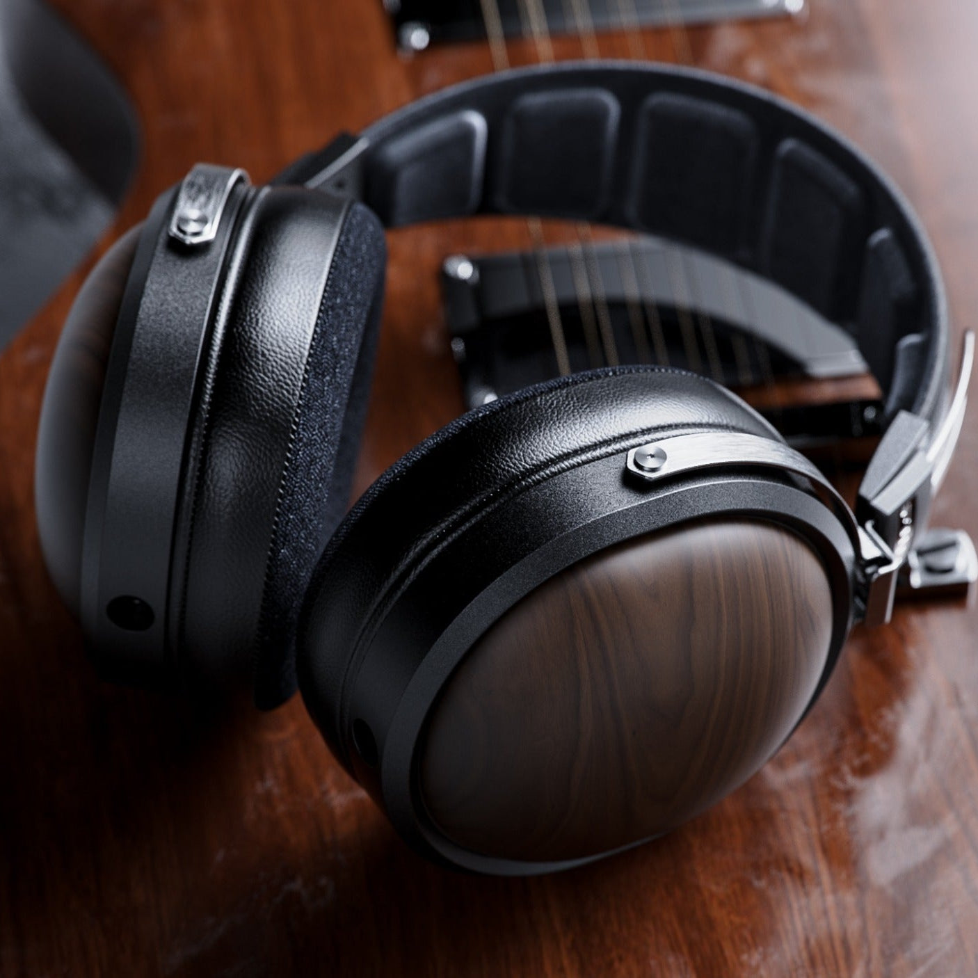 FiiO FT1 closed-back over-ear headphones with walnut wood cups, in black