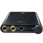 FiiO Q3 headphone amplifier and DAC featuring a sleek design and multiple input options for enhanced audio quality.