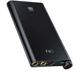 FiiO Q3 headphone amplifier and DAC with sleek design and multiple connectivity options for enhanced audio experience.