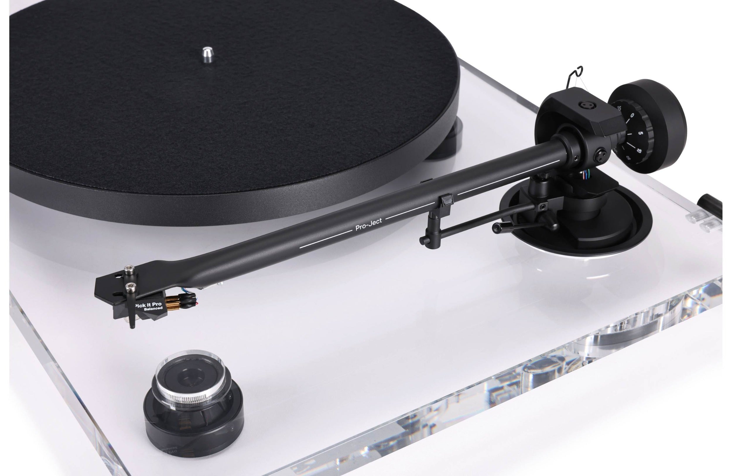 Pro-Ject XA B turntable with wooden plinth and tonearm, showcasing its sleek design and high-quality audio setup.