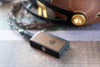 iFi Audio Go BLU headphone amplifier and DAC with sleek design and compact size, shown in the product image.