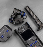 Zoom H5 Studio digital recorder with detachable capsules and multiple input options, shown with its accessories and controls.