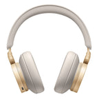 Bang & Olufsen Beoplay H95 wireless headphones in gold with cushioned ear cups and sleek design.