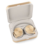Bang & Olufsen Beoplay H95 wireless headphones in elegant gold, showing over-ear design and plush ear cushions.