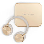 Bang & Olufsen Beoplay H95 wireless headphones with gold finish, over-ear design and cushioned ear cups.