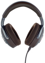 Focal Hadenys wired headphones with a close-up of the earcup and cable connection showing the sleek design and branding.