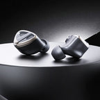 FiiO FH19 in-ear headphones with sleek black design and detachable cables, showcasing high-quality audio and detailed craftsmanship.