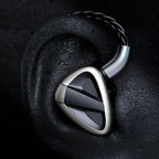 FiiO FH19 in-ear headphones with silver and black design, featuring multiple drivers and a sleek, ergonomic shape.