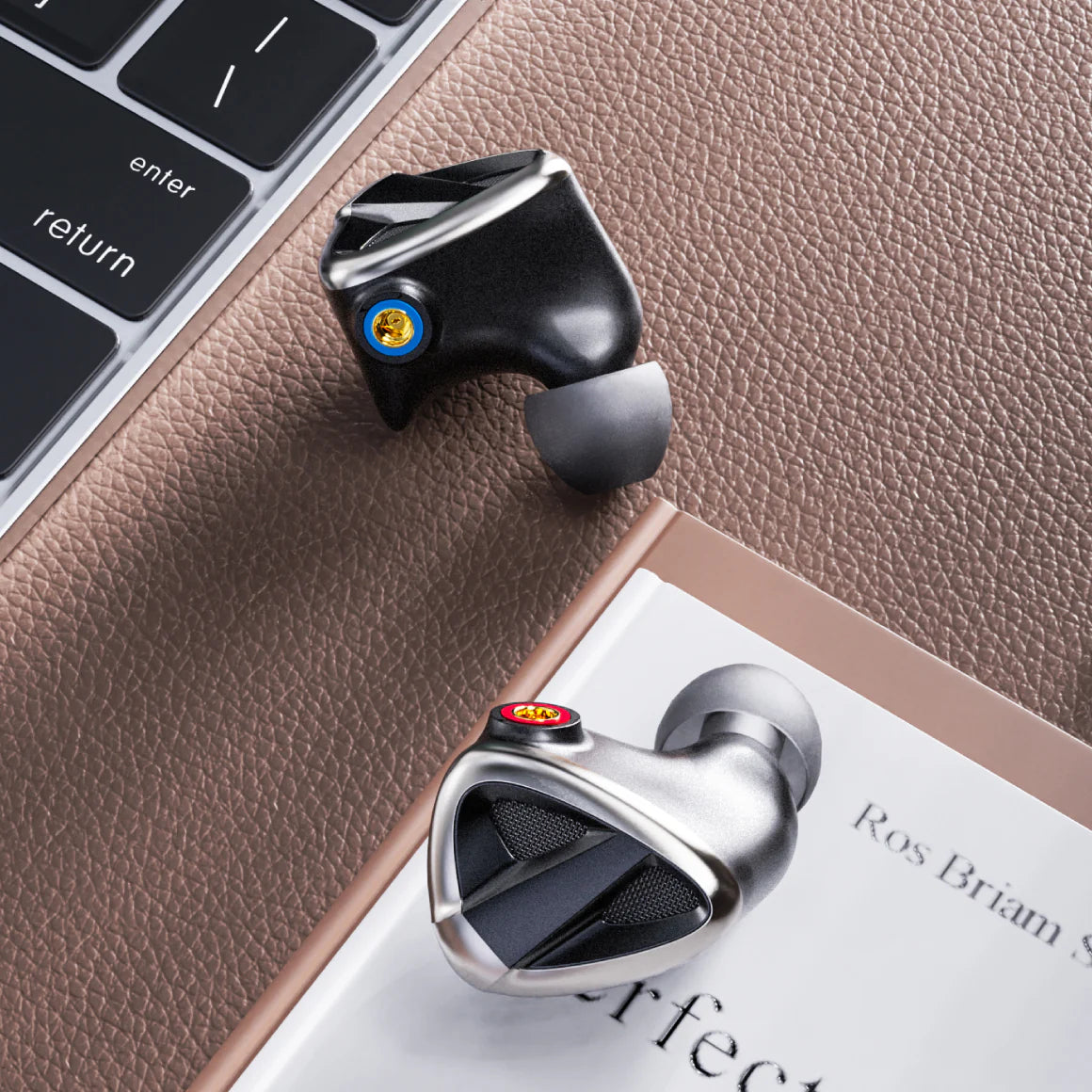 FiiO FH19 in-ear headphones with silver earphones and black cables, detailed close-up view of the FiiO audio earbuds.