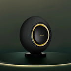 Marantz Horizon wireless speakers in midnight finish, sleek design with fabric-covered speakers and modern audio equipment appearance.