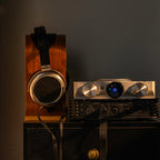 iFi Audio iCAN Phantom 1.5 on a cabinet driving STAX electrostatic headphones