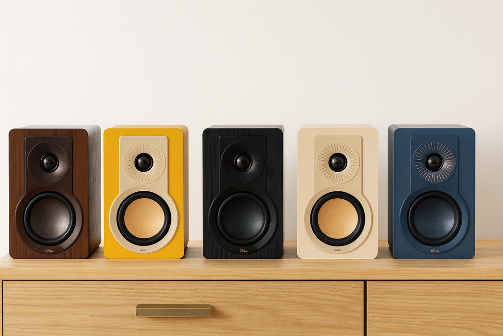 DALI Kupid passive bookshelf speakers with sleek black finish and compact design, ideal for high-quality home audio systems.