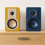 DALI Kupid passive bookshelf speakers with sleek black finish and compact design, ideal for high-quality home audio setups.