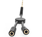 Native Instruments Traktor DJ Cable adapter, a splitter for DJ equipment with multiple connection ports.