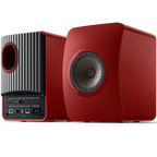 KEF LS50 Wireless II wireless speakers with sleek black design and front grille, showcasing high-quality audio equipment.