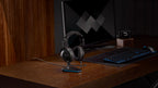 Rode NTH-100M gaming headphones with over-ear design, black color, and adjustable headband for immersive gaming audio.