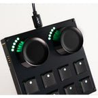 Intech Studio TEK2 Mechanical Series 3 MIDI controller with multiple black keys and control knobs on a sleek surface.