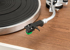 Close-up of JBL TT350 turntable with lid open, showing the turntable platter and tonearm in detail.