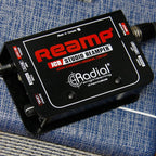 Radial Engineering JCR DI box showing front panel with input, output, and control knobs for professional audio signal management.