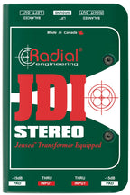 Radial Engineering JDI stereo DI box showing top view with input and output connections on a professional audio equipment surface.