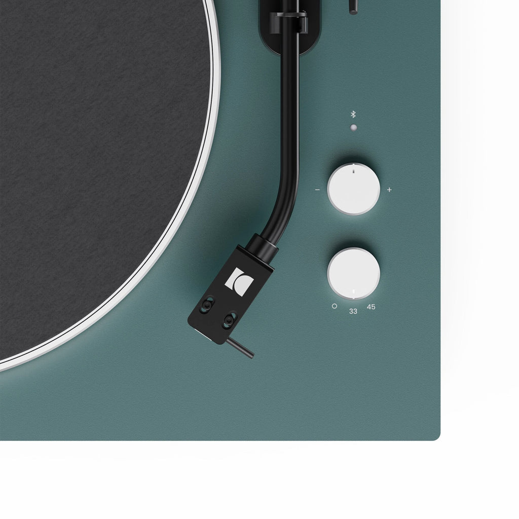 Kanto Audio OBI3 Gen 2 turntable, Green, close-up of tonearm and start/speed buttons