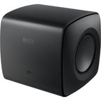 KEF KC62 subwoofer with sleek black enclosure and compact design, perfect for enhancing bass in home audio systems.