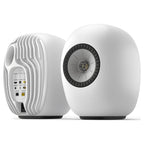 KEF LS Luxe wireless speakers in Mineral White, front and rear view of the pair
