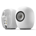KEF LS Luxe wireless speakers in Mineral White, front and rear view of the pair