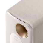 KEF LSX II wireless bookshelf speakers, on floor stands