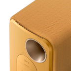 KEF LSX II wireless bookshelf speakers, on floor stands