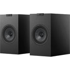 Pair of KEF Q1 Meta passive bookshelf speakers with sleek black cabinets and front-facing drivers on a white background.
