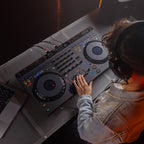 AlphaTheta DDJ-GRV6 DJ controller with jog wheels, control knobs, and performance pads for professional mixing.