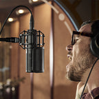 Shure KSM44MP condenser microphone with multiple pickup patterns and professional studio design.