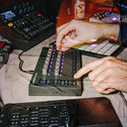 Novation Launch Control 3 MIDI controller with colorful pads and knobs, designed for music production and live performance.