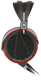 Audeze LCD-2 wired headphones with leather ear cups and headband, shown from a side view highlighting their sleek design.