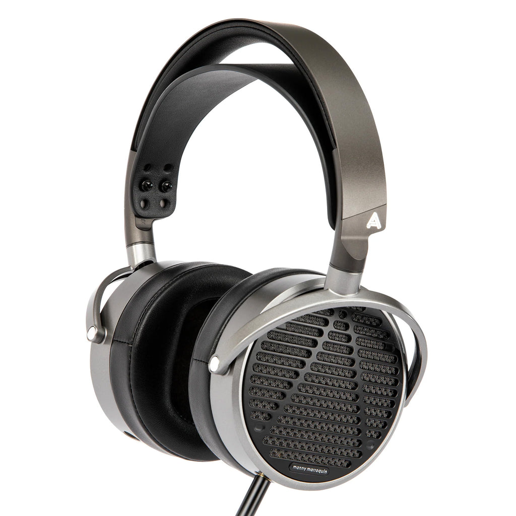 Audeze MM-100 studio headphones with large over-ear design, black ear cups, and adjustable headband for professional audio mixing.