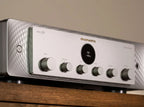 Marantz MODEL 50 stereo amplifier with sleek design and control knobs, displayed in a collage image showing front and side views.