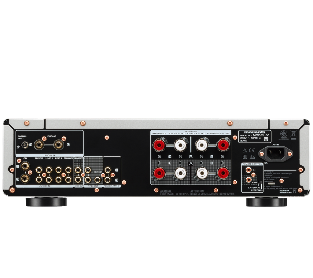 Marantz MODEL 50 stereo amplifier with silver finish, back panel showing input and output connections, in a studio setting