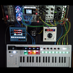 1010music Bluebox digital mixer with modular setup, featuring multiple control knobs and input/output ports in a square layout.