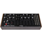 Moog DFAM analog synthesizer with patch points and control knobs, showcasing its modular design and expressive interface.