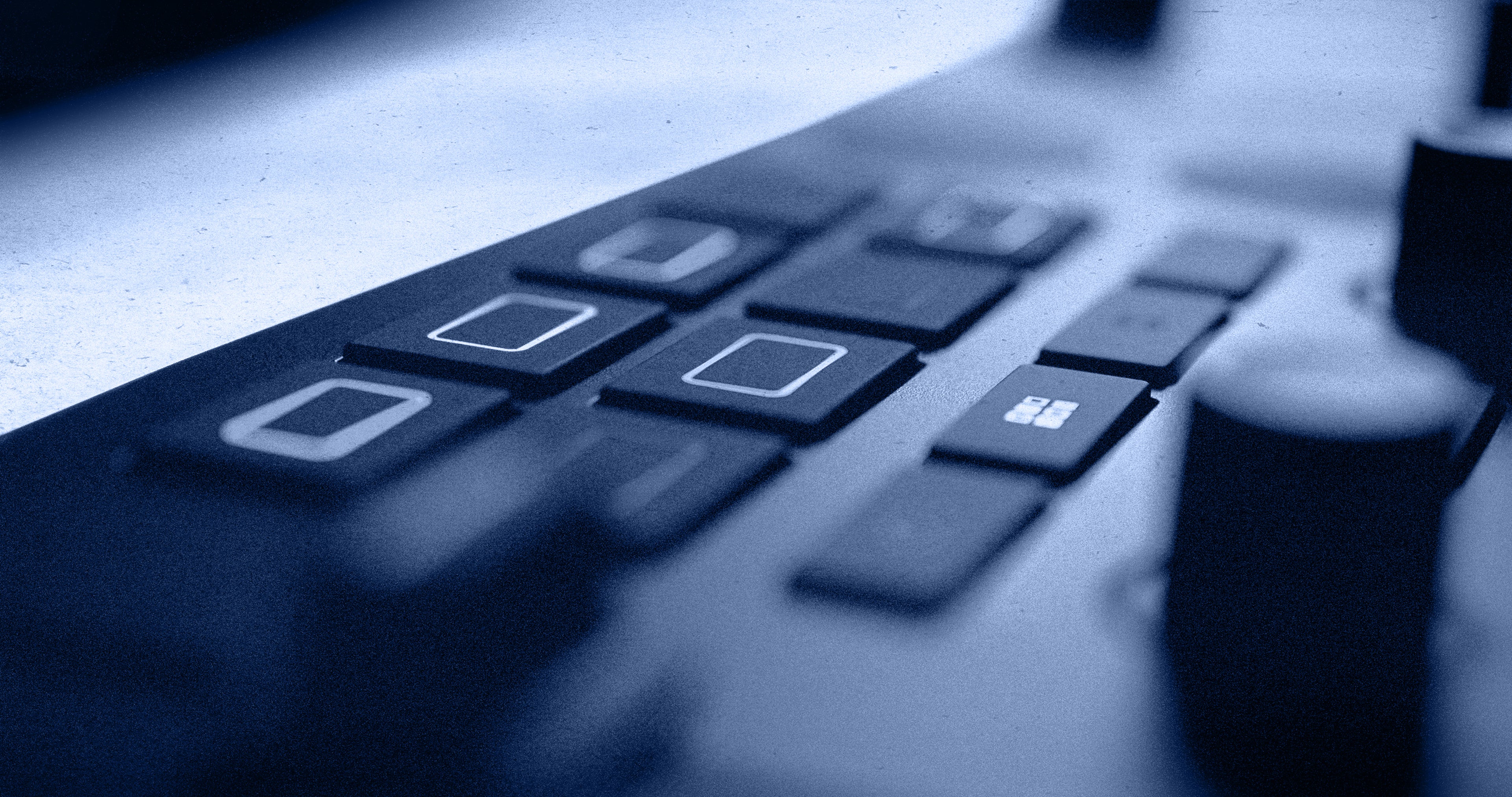 Native Instruments Traktor MX2 DJ controller with dual jog wheels, buttons, and knobs for professional DJ mixing and control.