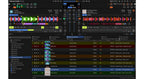 Native Instruments Traktor Pro 4 DJ software interface with mixing controls and waveforms displayed on a computer screen.