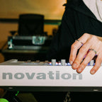 Novation Launchkey 49 MK4 MIDI keyboard, in white, lifestyle setting