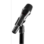 Austrian Audio OD303 dynamic microphone on a stand, black professional microphone for studio or live sound applications.